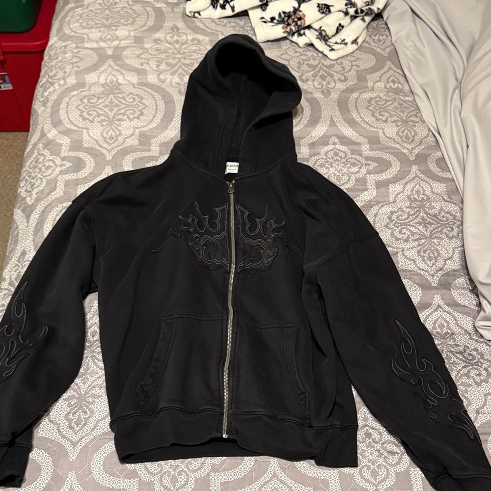 Hollister Black Zip-Up Hoodie with Subtle Flame Embroidery